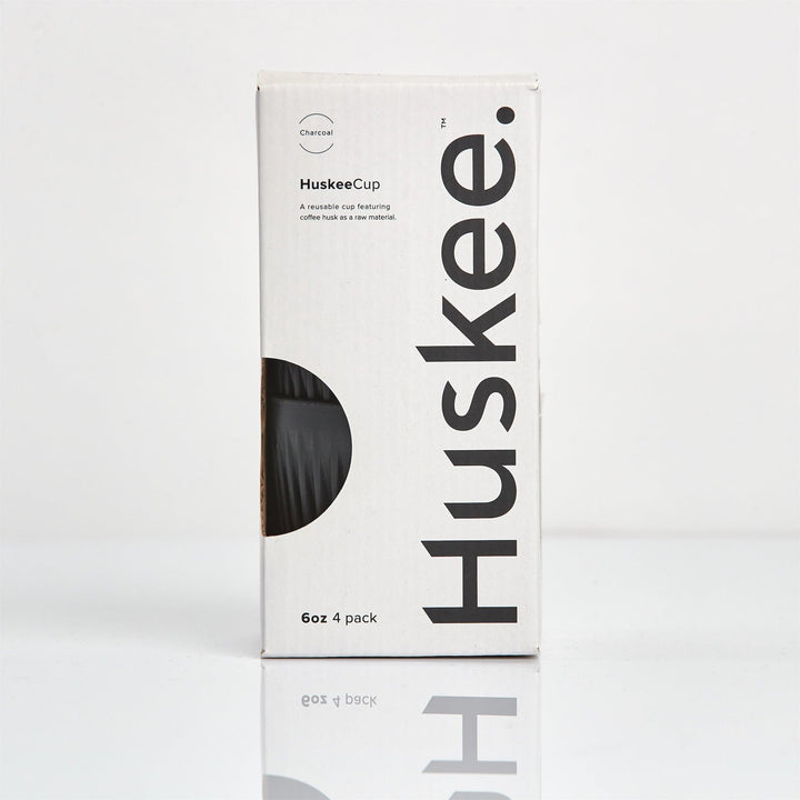 Boxed charcoal HuskeeCup 4 pack, front view