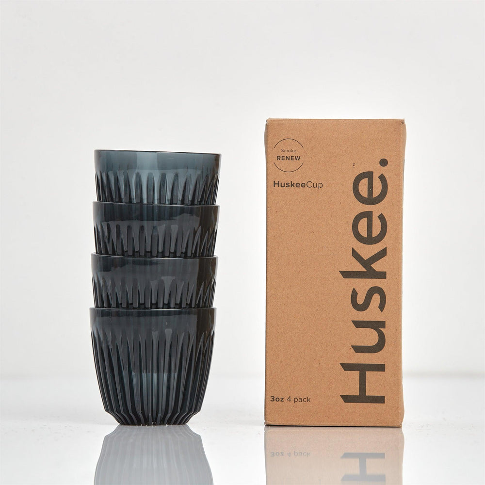 Smoke HuskeeRenew cups stacked beside box