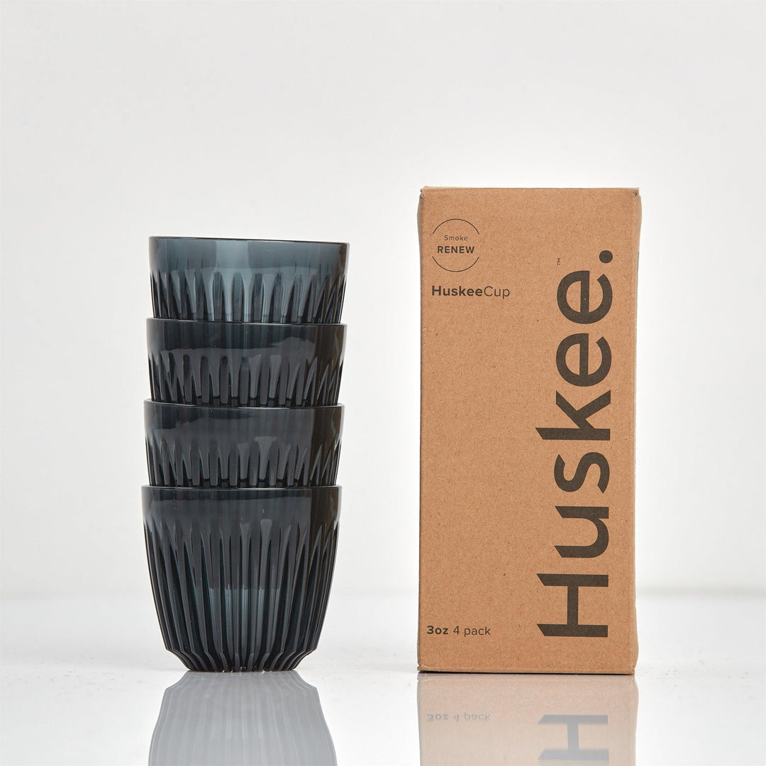Smoke HuskeeRenew cups stacked beside box